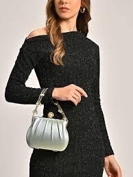 Sexy Clutches: How to Buy & Wear a Designer Clutch Bag